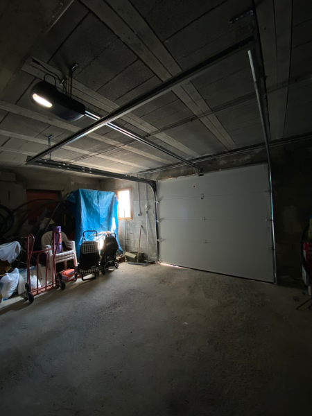 Installation porte de garage sectionnelle 